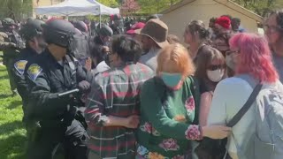 Indiana University Bloomington police and protestors clash during protests 33 arrested [upl. by Ennirac]