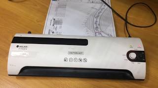 How to laminating a3 size paper [upl. by Adnilam]