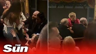 Disruptive audience members are forcibly removed from Manchester theatre by security [upl. by Airtened]