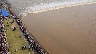 Worlds Largest Tidal Bore Forms in Chinas Qiantang River [upl. by Edrahc25]