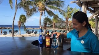 Blue Curacao cocktail  recipe signature drink Avila Beach Hotel on Curacao [upl. by Cir]