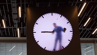 The Man in the Clock  Amsterdam Airport Schiphol  Who live in clock [upl. by Sami]