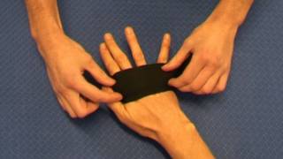 How to tie Muay Thai hand wraps [upl. by Atilrak407]