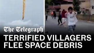 Space rocket debris rains down on villagers in China [upl. by Eiramit]