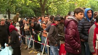 Hundreds of migrants apply for asylum in Germany [upl. by Nilyahs]