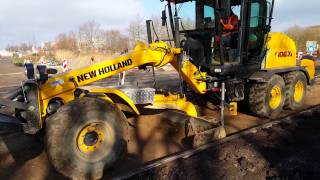 NewHolland F1067A Motorgrader  Leveling gravel foundation  Drenth Graderverhuur [upl. by Daffodil]