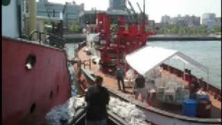 Tug quotCornellquot freeing fireboat quotJohn J Harveyquot from mudbank [upl. by Euh360]