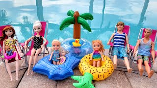 Family floaties day  Elsa amp Anna toddlers  Barbie dolls  gems  playing [upl. by Eirak]