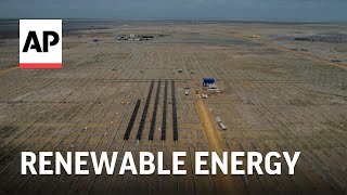 India builds its largest renewable energy project in the salt deserts bordering Pakistan [upl. by Amhser]