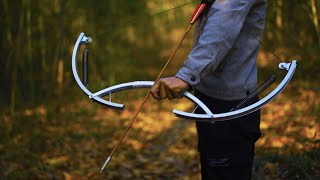 How To Make a Spring Resilience Powered Bow From Bicycle Wheel [upl. by Artimed251]