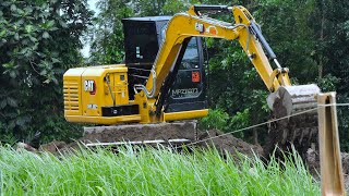 Mini CAT Excavator Working Landscaping Dirt [upl. by Endor889]