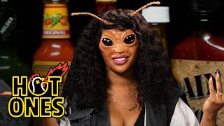 SZA Bugs Out While Eating Spicy Wings  Hot Ones [upl. by Ellerehc217]