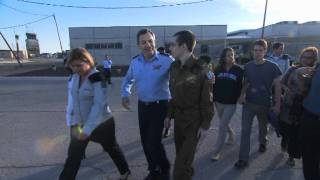 Gilad Shalit and his family board the helicopter that carries them back home [upl. by Gaby]