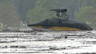 Lake Dunlap Flood 2015  yellow Nautique goes over dam [upl. by Brace]