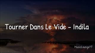 Indila  Tourner dans le vide Lyrics [upl. by Ainoda]