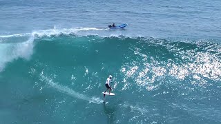 Foil surfing in front of the Uluwatu cliffs [upl. by Buseck]