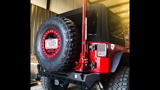 Motobilt JK Spare Tire Carrier with Tag Relocation Kit amp Universal High Lift Jack Mount [upl. by Yasdnyl]