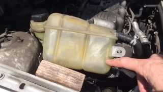 How To Fix A Leaky Coolant Overflow Tank [upl. by Ymmor]