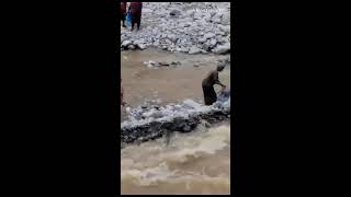 How People In Africa Were Rescued By Excavator From Floods River [upl. by Natek82]