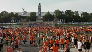 Dutch fans march towards Leipzig Stadium ahead of France game [upl. by Hellman]