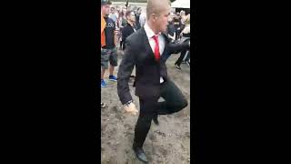 Guy looks out of place wearing a suit to a festival until the beat drops  CONTENTbible [upl. by Emmanuel]