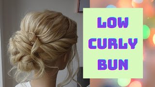 How to do a low curly bun hair tutorial [upl. by Ebonee]