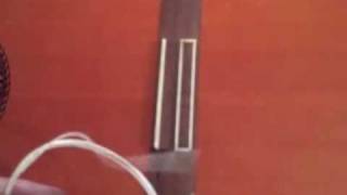 How to put strings on a classical guitar  a close up [upl. by Flavian653]