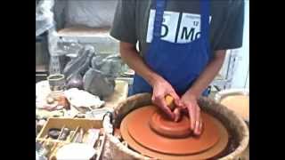 Pottery Helpsmoothing groggy red clay and making a mug [upl. by Venable606]