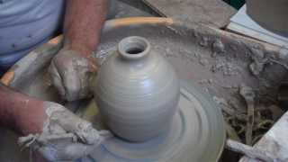 pottery throwing a narrow necked bottle [upl. by Blayne]