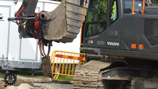 Volvo Excavator Pick up curbstones with the Rototilt grapple [upl. by Lorne606]