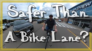 Cycling Through A Busy Parking Lot is Safer Than Using a Bike Lane [upl. by Daria]