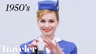 100 Years of Flight Attendant Uniforms  Condé Nast Traveler [upl. by Ojela]