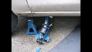 Lift a car safely using a jack and an axle stand [upl. by Chita]