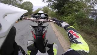 Supermoto  2 Stroke vs 4 Stroke downhill battle [upl. by Nwonknu]