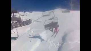 Snowboarder Knocks Skier Off Chairlift [upl. by Graces447]