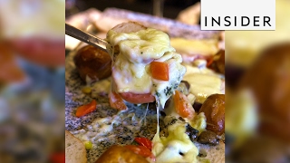 An NYC bar has a DIY raclette station and its mouthwatering [upl. by Iraam]