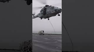 Sailors abord the aircraft carrier particopate with a vertical replesnishment at sea shorts [upl. by Pearlman4]