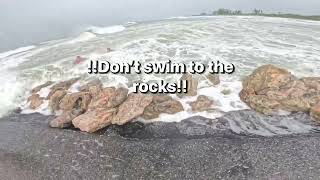 Hurricane Helene Few people swept away by waves into the jetty rocks hurricane danger safe [upl. by Ari]