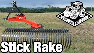 🚜 Discount Implements  Stick Rake Demo [upl. by Ardnasak973]