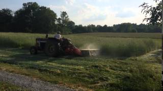 Mowing hay with a disk mower [upl. by Arela760]