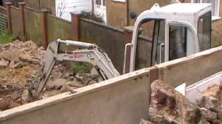 Takeuchi TB016 Loading Lorry with Rubble [upl. by Lady]