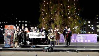 Christmas carol singers on Trafalgar Square London 2009 [upl. by Acilgna]