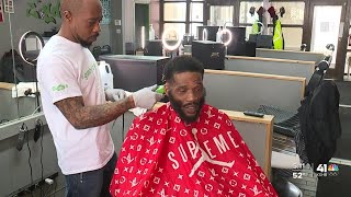 Kansas City barber pays it forward by giving students free haircuts [upl. by Alisun]