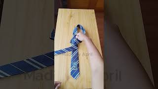 How to tie a tie on table  The quickest way to tie a necktie  Easy steps to tie a tie 10seconds [upl. by Golanka]