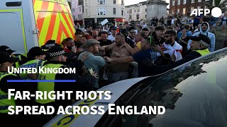 Farright rioters clash with police during protests across UK cities  AFP [upl. by Anhavas]