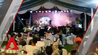 Indonesia tsunami Wave crashes into concert by local pop band Seventeen [upl. by Gant]