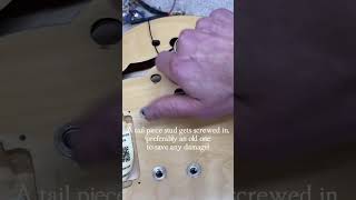 Removing tune o matic bushings from this guitar luthier guitartech guitarrepair guitarist [upl. by Adnoel]