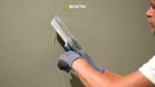 BOSTIK STUCCO W105 EGALISATIEMORTEL  APPLICATIE [upl. by Hcra]