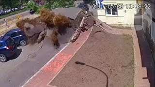 Underground water pipe explosion destroys road in Ukraine [upl. by Aivata]