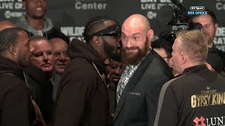 FACEOFF Deontay Wilder and Tyson Fury push each other and thrown off stage [upl. by Krissie]